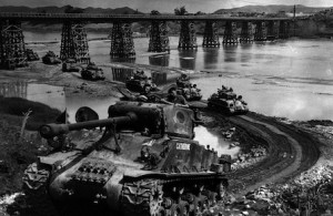Sherman tanks of B Squadron, Lord Strathcona's Horse grind a path up the bank of the Imjin River, in 1952. Almost 27,000 Canadians served in the Korean War which ended July 27, 1953. (CP PHOTO/National Archive of Canada)